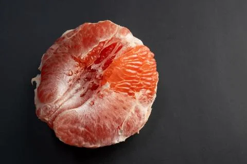 Grapefruit on a black background, close-up, horizontal Stock Photos