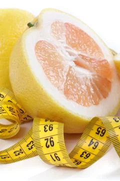 Grapefruit with centimetre. Stock Photos
