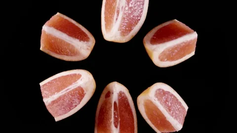 Grapefruit Cut and Slices in slow motion Stock Footage 118577763