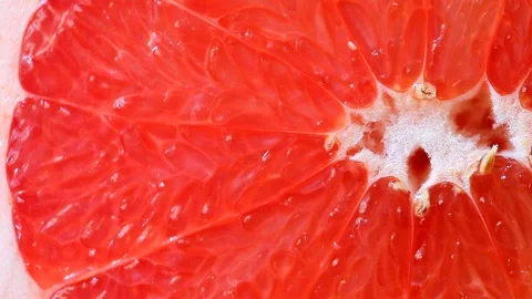 Grapefruit cut rotates Stock Footage 122976912