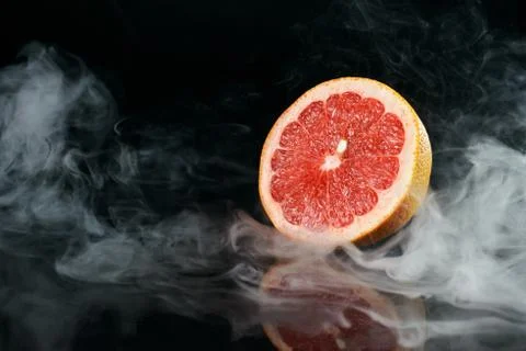 Grapefruit in fragrant smoke Stock Photos
