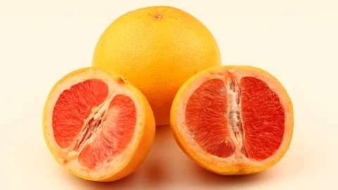 Grapefruit fruit sliced white background Stock Footage 126170247