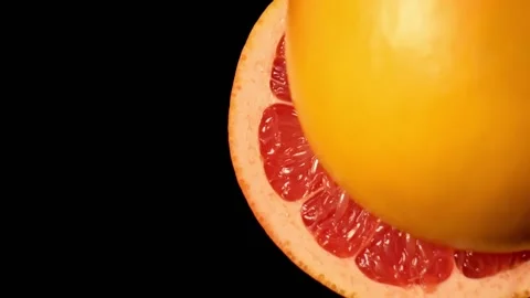 Grapefruit halves on the black background Stock Footage 150004690