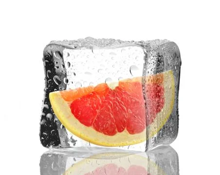 Grapefruit in ice cube  Stock Photos