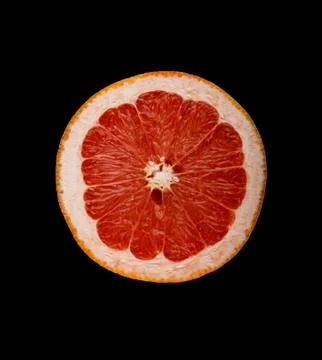 Grapefruit isolated on a black background Stock Photos