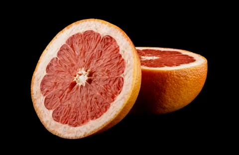 Grapefruit isolated on a black background Stock Photos