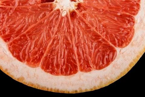 Grapefruit isolated on a black background Stock Photos