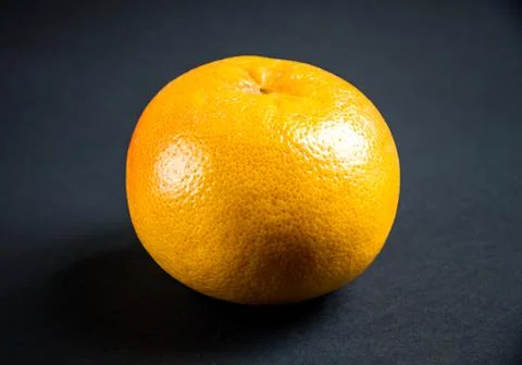 Grapefruit isolated on a black background Stock Photos