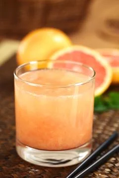 Grapefruit juice Stock Photos