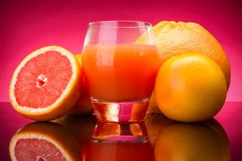 Grapefruit juice Stock Photos
