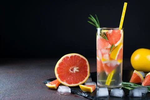 Grapefruit lemonade. Two glasses of refreshing drink, water with  grapefruit, Stock Photos