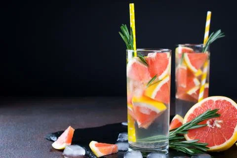 Grapefruit lemonade. Two glasses of refreshing drink, water with  grapefruit, Stock-Fotos