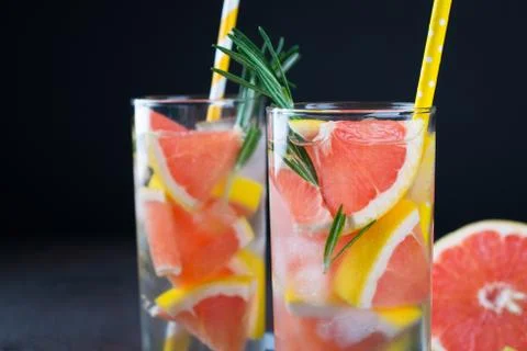 Grapefruit lemonade. Two glasses of refreshing drink, water with  grapefruit, Stock Photos