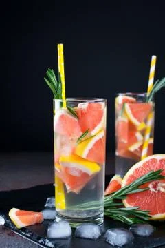Grapefruit lemonade. Two glasses of refreshing drink, water with  grapefruit, Stock Photos