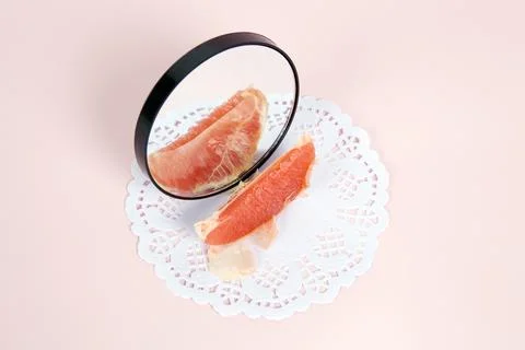 Grapefruit mirror Stock Photos