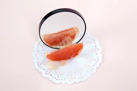 Grapefruit mirror Stock Photos