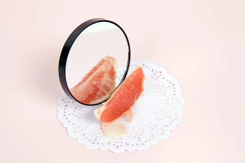 Grapefruit mirror Stock Photos
