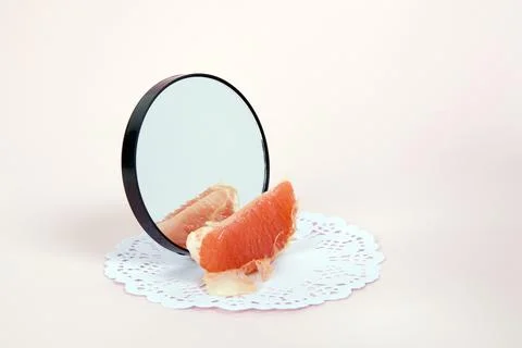 Grapefruit mirror Stock Photos