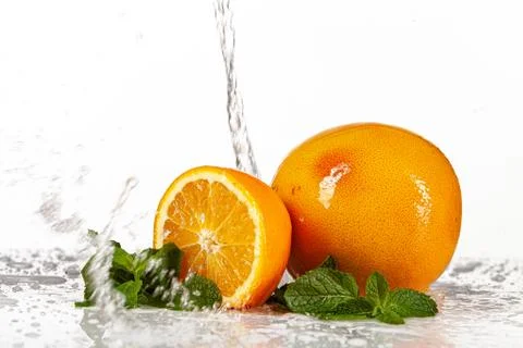 Grapefruit, Orange And Mint Stock Photos