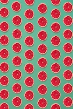 Grapefruit pattern isolated on blue background. Flat lay 写真素材
