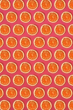 Grapefruit pattern on pink background. Minimal flat lay concept. Stock Photos