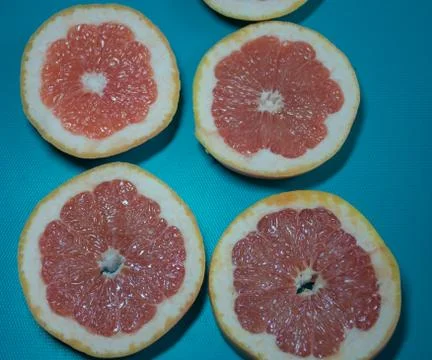 Grapefruit on plate Stock Photos