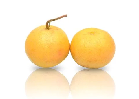 Grapefruit with reflection isolated on white background Stock Photos