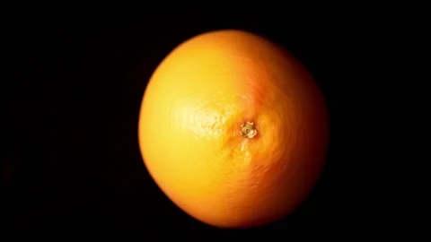 Grapefruit rolls on black background 스톡 동영상 149996984