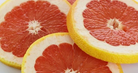 Grapefruit rotating on white background Stock Footage 102401725