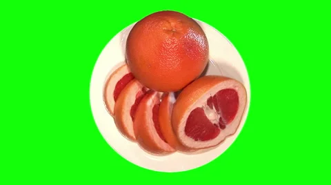 Grapefruit with segments on plate, top shot Stock Footage 48126219