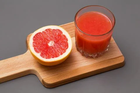 Grapefruit slice and juice Stock Photos