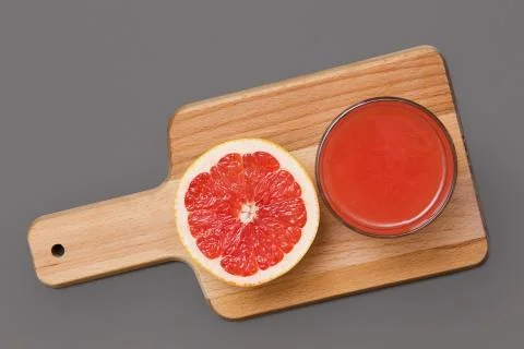 Grapefruit slice and juice Stock Photos