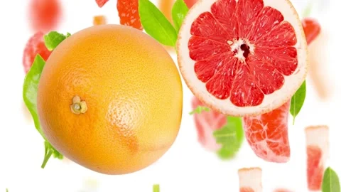 Grapefruit Slice and Leaf Stream Stock Footage 199587334
