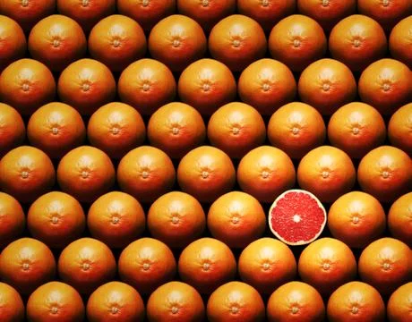 Grapefruit slice between group Stock Photos