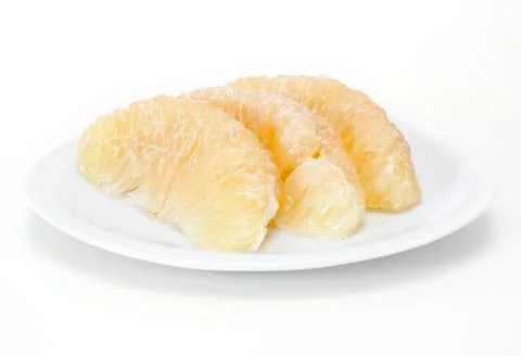 Grapefruit slice in a plate Stock Photos