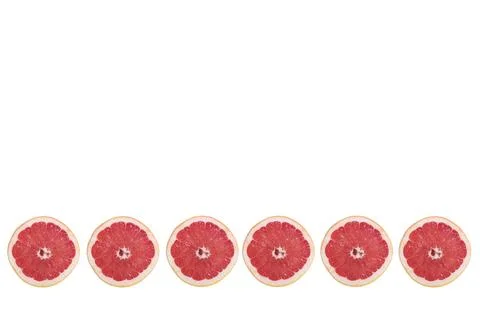 Grapefruit slice on white background Stock Photos