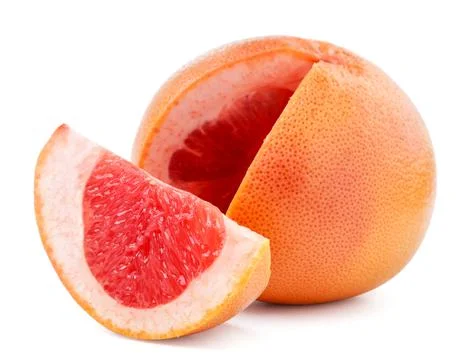 Grapefruit sliced on a white background. Isolated Stock Photos