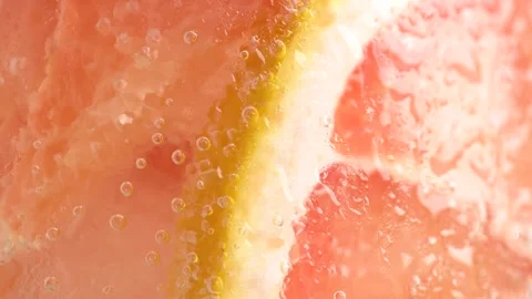 Grapefruit slices and mint in fizzy sparkling tonic with bubbles, juice ref.. Stock Footage 281269867