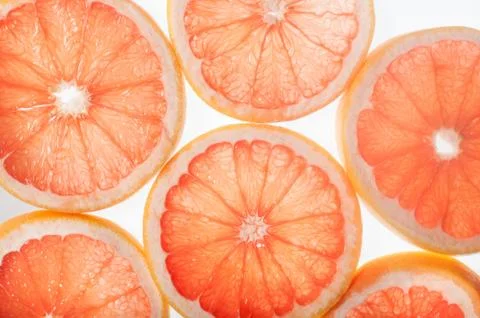 Grapefruit slices with back light Stock Photos