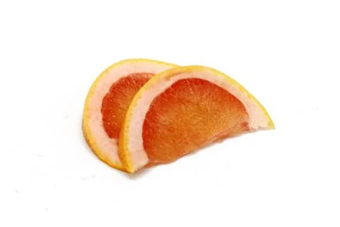 Grapefruit slices isolated on white Stock Photos
