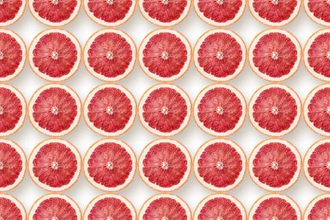 Grapefruit slices pattern on white Stock Photos