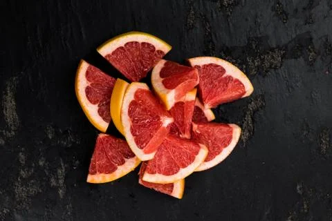 Grapefruit slices (selective focus) Stock Photos