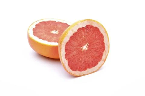 Grapefruit slices on white background Stock Photos