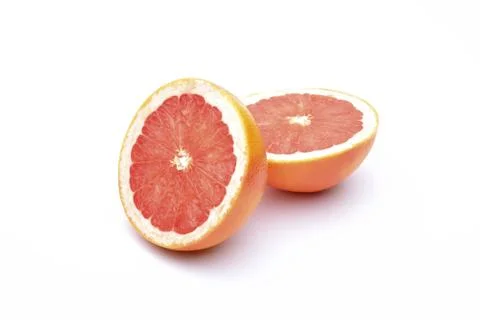 Grapefruit slices on white background Stock Photos
