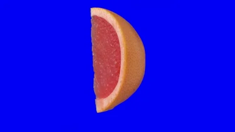 Grapefruit Wedge spin 360 degrees isolated on blue screen Stock Footage 144533564