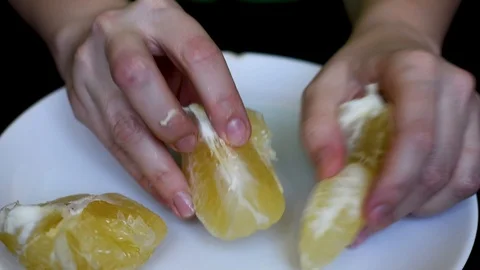 Grapefruit on a white background cleanses the skin for a meal Stock Footage 95662776