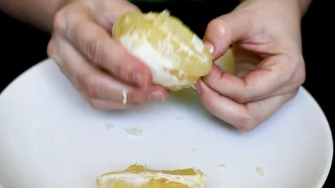 Grapefruit on a white background cleanses the skin for a meal Stock Footage 95662829