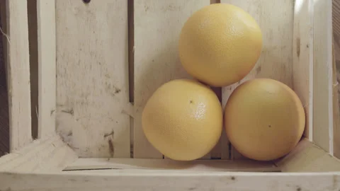 Grapefruit in wooden crate Stock Footage 320155507