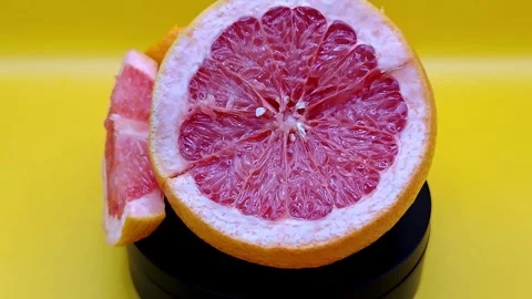 Grapefruit on yellow Stock Footage 330968528