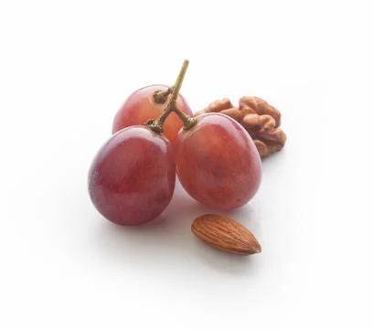 Grapes and nut Stock Photos